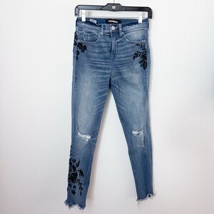 Express Women's Distressed Blue Jeans with Black Floral Accents 0P